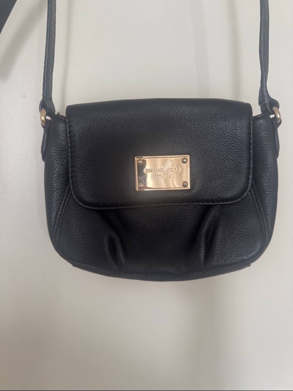 Michael Kors Black Pebbled Leather Mini Crossbody with Gold Plaque